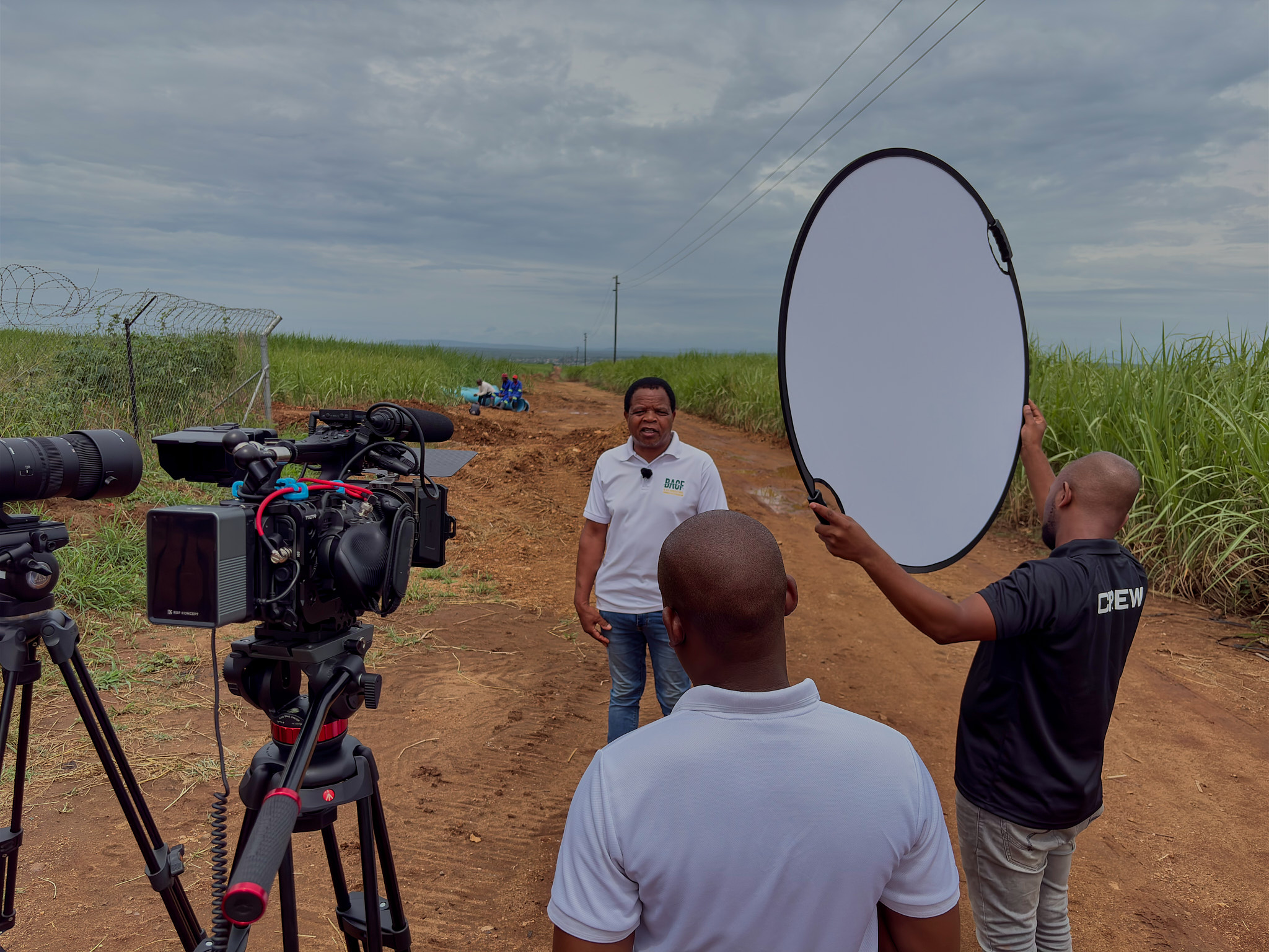 Professional videography — outdoor interview with reflector